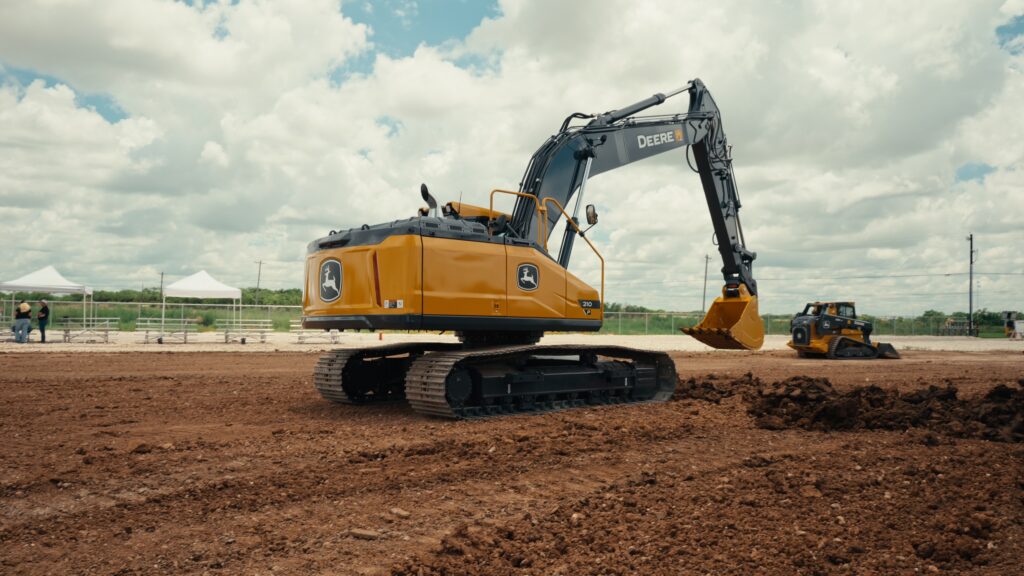 Rear view of John Deere 210 P-Tier construction excavator